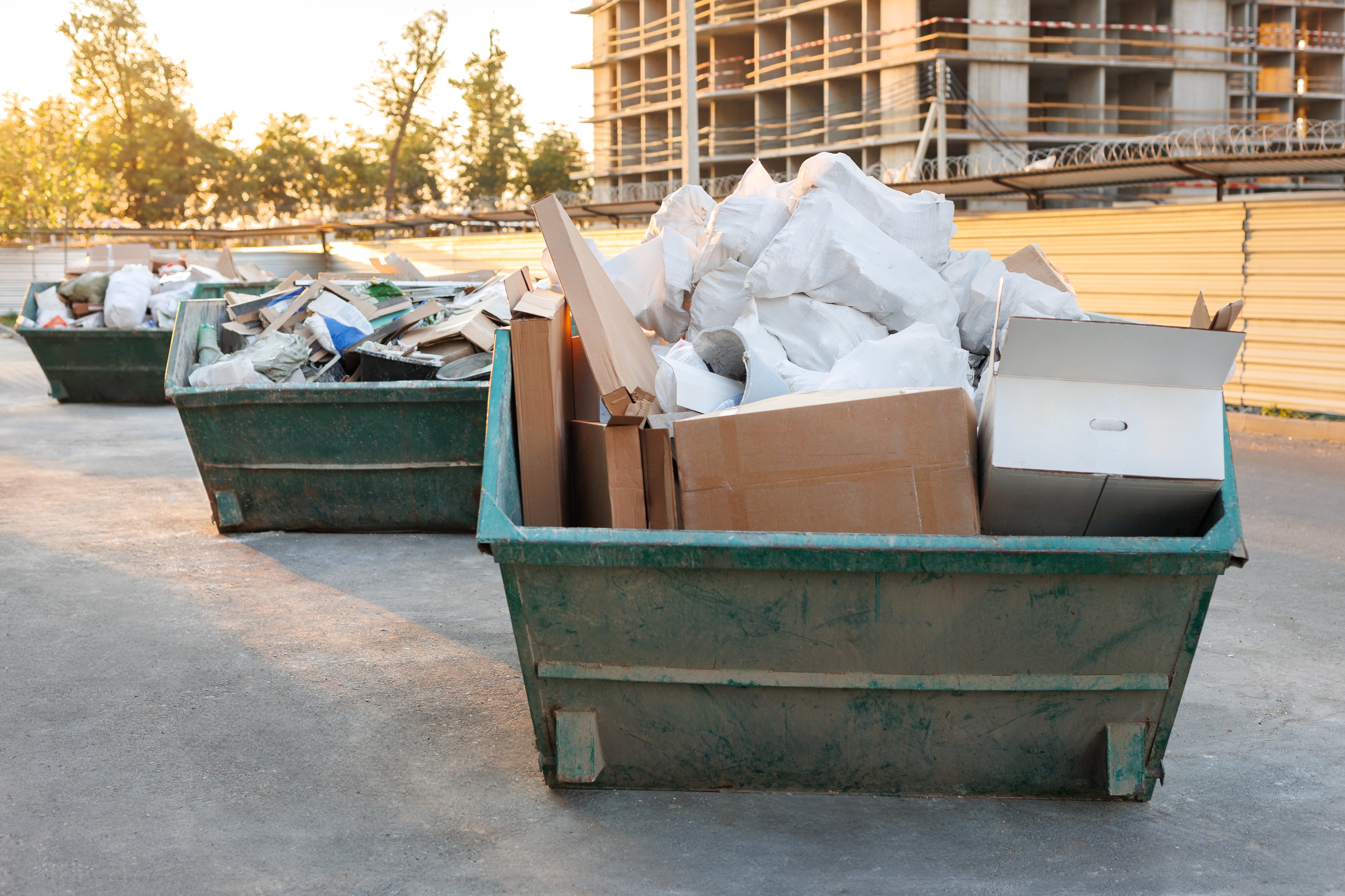 photo of skips with reusable construction materials